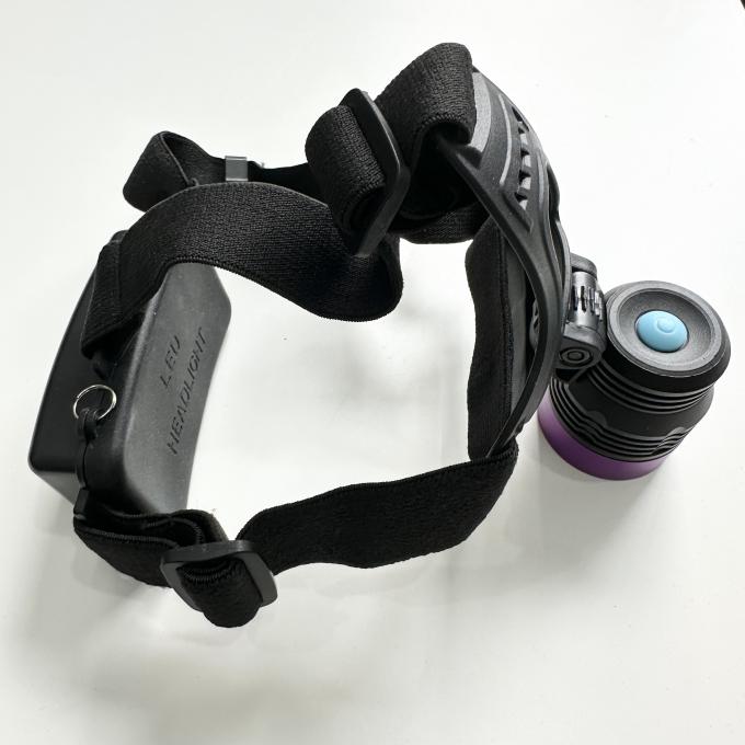 Đèn đội đầu UV hạt từ huỳnh quang DG-3101S với bước sóng đỉnh 365-370nm và 2 pin lithium 18650 3